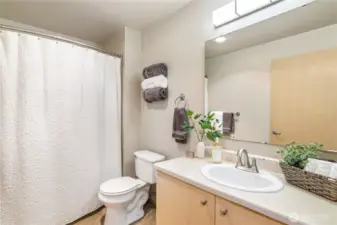 Spacious bathroom with tub for a soak.