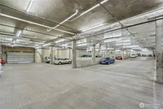 Secure parking garage with dedicated parking stall