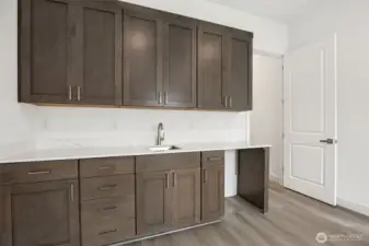 Extra living room area with separate entrance  Photos are of a different home. Standard finishes and features are similar and can be modified.