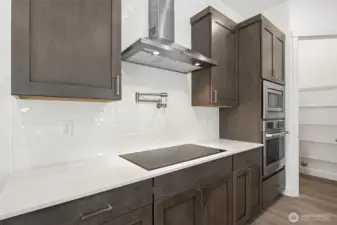 Photos are of a different home. Standard finishes and features are similar and can be modified.