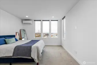 Primary bedroom with views of the Cascades