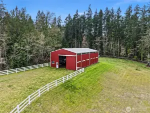 Barn Front Entry & Fencing – The barn entry area with fencing provides easy access for horses and equipment.