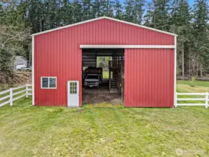 Barn Entry Close-Up –There is water and power to the barn to maximize functionality and potential. A closer look at the barn’s front entrance and equestrian facilities.