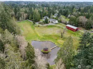 Aerial View of Property – Wide aerial capturing the full setting and privacy of this Bainbridge Island equestrian estate.