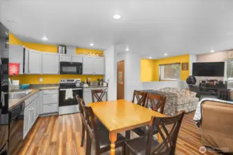 Open concept eat-in kitchen and living room