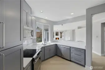 Kitchen pantry has pull out drawers for convenience and easy access