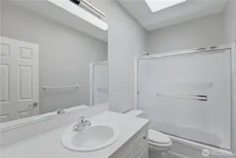Guest bathroom with tub