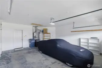 Oversized garage with tons of storage and attic access