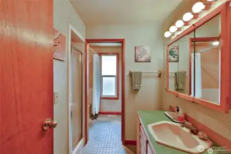 Guest bathroom with tub and separate shower