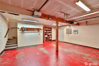 2 car attached garage has adjacent storage area and 1/2 batg