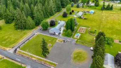 Virtually Enhanced to show 2nd circular driveway with plenty of room for RV, Truck, Boat Parking