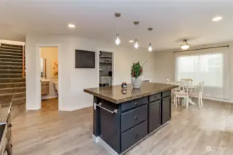 Half bath and pantry from kitchen.