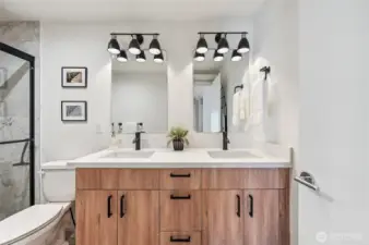 Spa-like en-suite bathroom is spacious and serene.