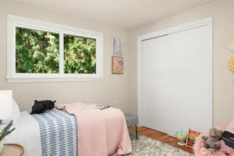 Third bedroom looks out onto the private backyard. It is currently being used as an office. This picture is from a previous listing.