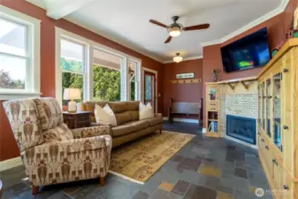 Den/Family Room with back door access to the porch