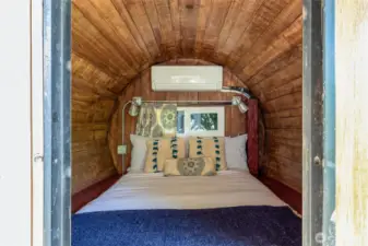 The interior of the wine barrel that sleeps two