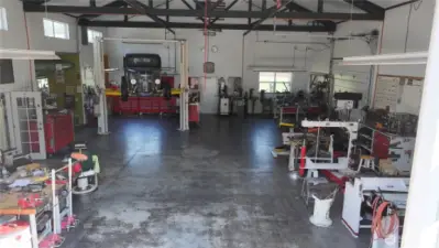 First section of the shop has Heat, office, laundry, 3/4 bath.