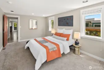 Main floor bedroom walks out onto the private backyard