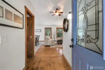 Enter to vaulted ceilings and gorgeous cedar trim.