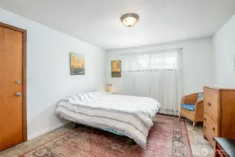 This bedroom is conveniently place on the main level of the home