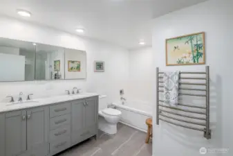 You will love the luxury of this 5 piece bathroom, complete with towel warmers.