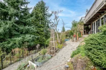 The lovely terraced yard gives plenty of space for you to use your creativity in the garden