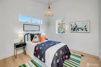 Second bedroom can easily accommodate a queen size bed. Each bedroom features individually controlled heat for everyone's comfort.