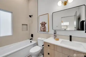 Ensuite to the second features includes a deep soaking tub and shower.