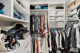 Walk in closet located in primary bathroom.