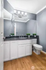 Convenient downstairs powder room.