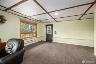 Lower level family room or bedroom.