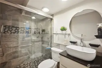 Updated three-quarter bathroom with modern fixtures.