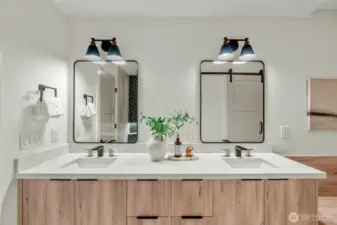Double vanities in shared bathroom.