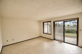 Family room with slider to backyard.