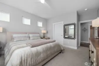 Spacious primary bedroom with walk-in closet