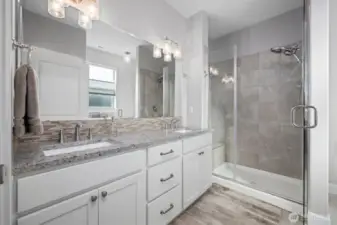 Double sinks and walk-in shower