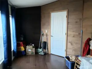 Another Opposite View of the Huge Den/Office/Media Room or another Living Room Area with Hard Wood Flooring. Newer Paint and Trim.