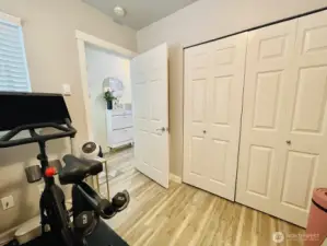 Main floor bath (or office, exercise or guest room) View with closet facing entrance on way to kitchen.