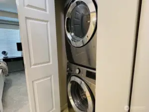 Full sized washer and dryer upstairs between bedrooms