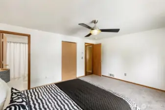 Ensuite bath and walk-in closet in the primary