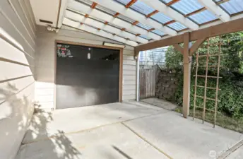 Backyard facing east. RV has a garage door that open to the backyard. How fun!
