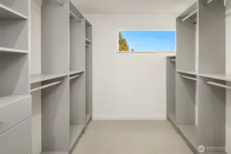 Primary bedroom walk-in closet.