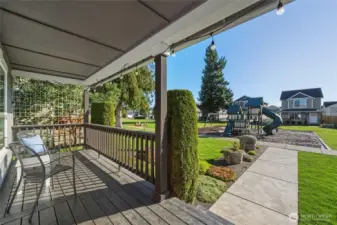 Enjoy peaceful mornings or evening chats on your covered front porch with southern sun exposure, directly overlooking the beautifully maintained community park. It’s the perfect perch for relaxing while keeping an eye on little ones at play.