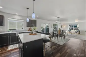 An eat up bar in the kitchen.
