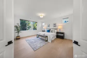 Spacious guest suite on main floor with its own ensuite bath.