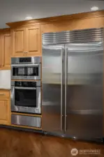 Chef’s kitchen featuring premium appliances including a 48" Sub-Zero refrigerator.