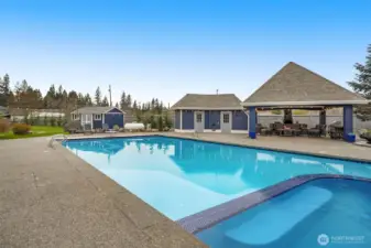 Pool, hot tub, and pool house creating the ultimate backyard retreat.