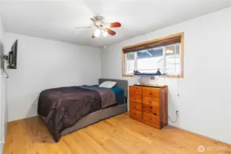 Second upstairs bedroom with new flooring. Closet not shown in photo.