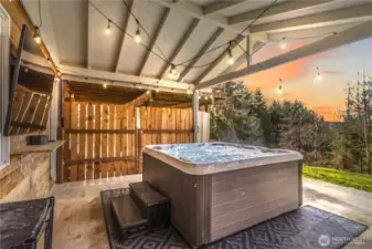 Private hot tub patio at twilight.