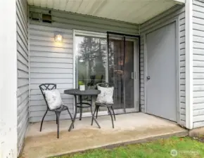 Enjoy coffee or cocktails on your private patio overlooking green space and pond